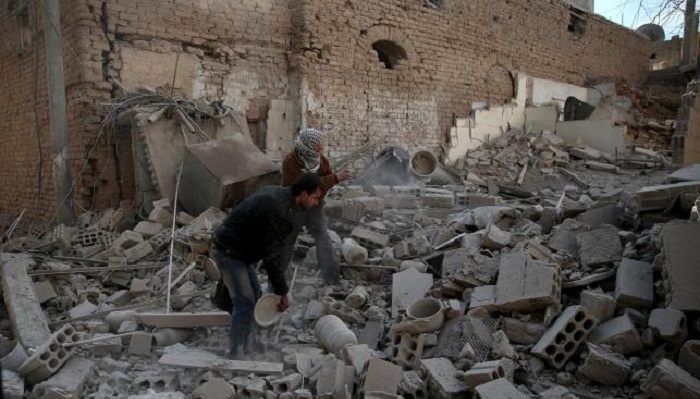 Dozens die in strikes on Syrian school district, other areas